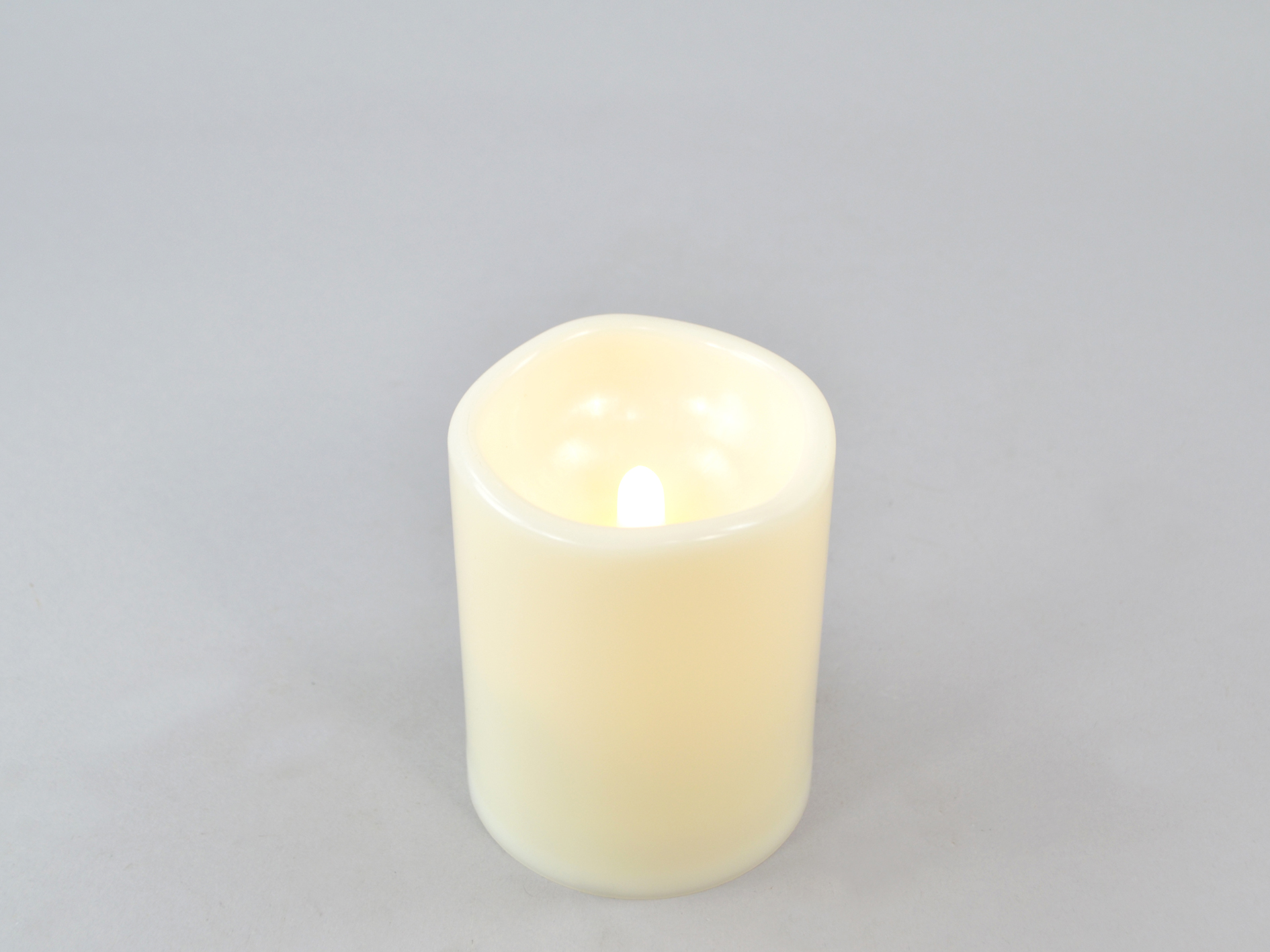 LED outdoor candle, ivory, Ø 7.8 x H 10 cm, IP65, remote/off/timer - 4 and 8 hours, dimmable, remote control optional, 2x AA batteries not included