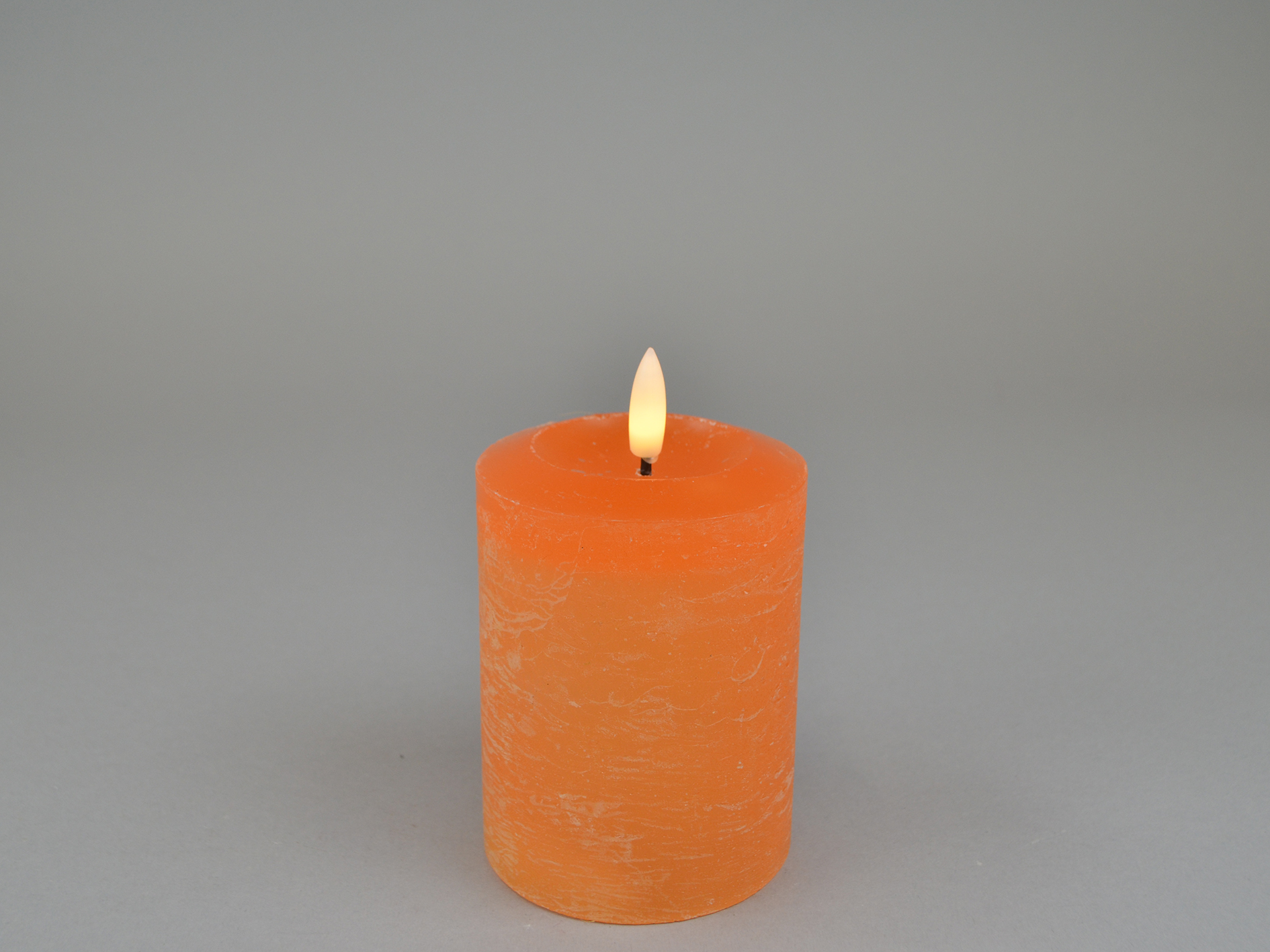 LED candle, 04 orange, D7.6xH10cm, remote/off/timer-6h, FB optional, 2xAA